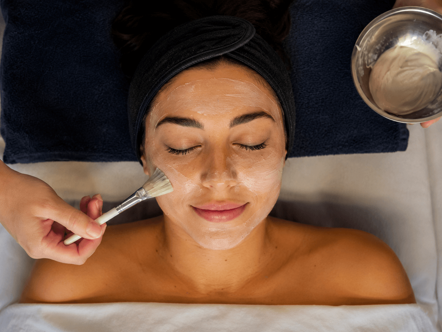 Wellness provider offering a calming treatment session