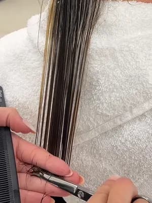 Raw footage: cutting the ends with scissors