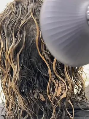 Raw footage: blow-drying curls