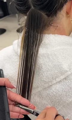 Raw footage: cutting the ends with scissors